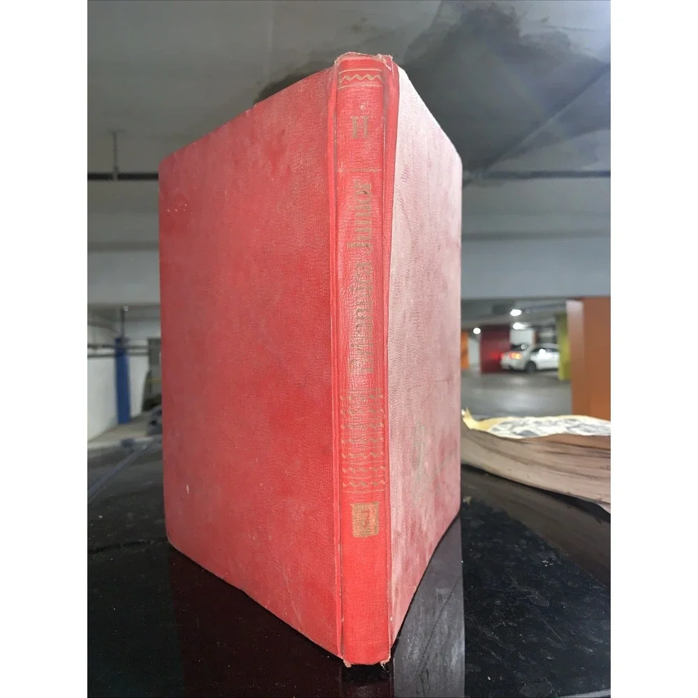 Volume 7 (H) of the vintage red and gold Britannica Junior Encyclopædia